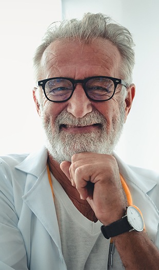 Smiling senior man with glasses