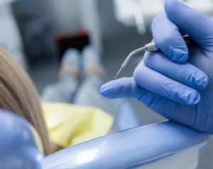 Laser periodontal treatment uses a soft tissue laser to remove infected gum tissue