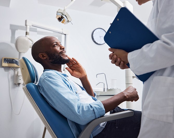 Man smiling in the dental chair