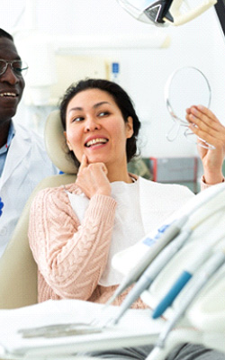 Woman smiling in the ental chair